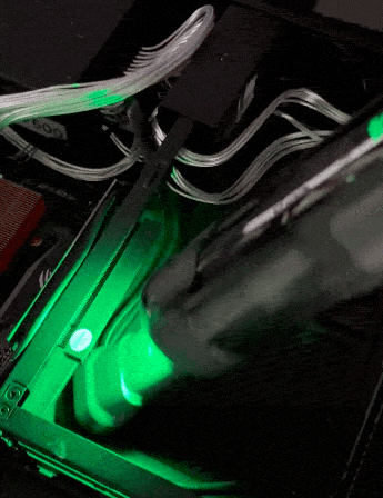 Guu Vision 2.0 reviews: Customer photo using the green LED light to clearly see and precisely clean dust from delicate computer PC internals.
