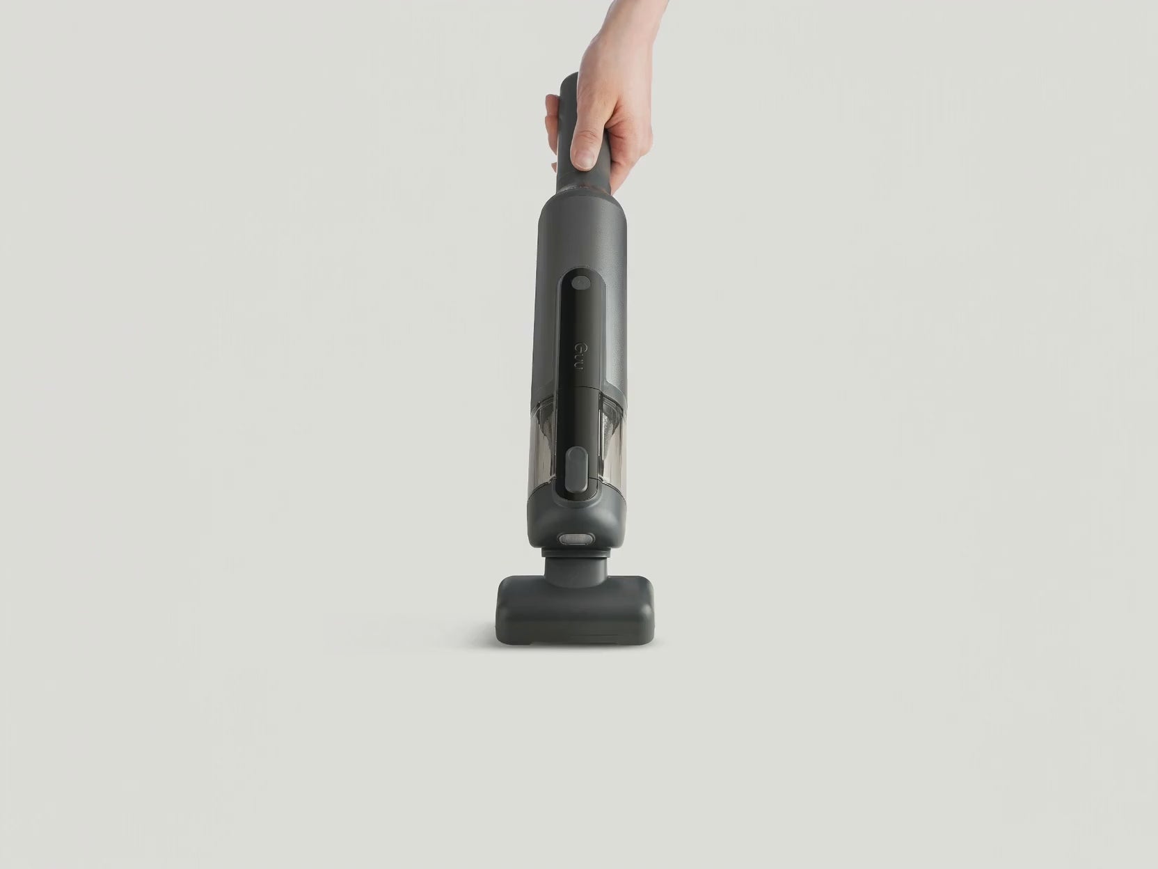 Video showing the Guu Vision 2.0 green dust-reveal light exposing invisible dust and hair, followed by powerful suction cleaning it instantly.